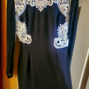 Bkack dress with cream decorations